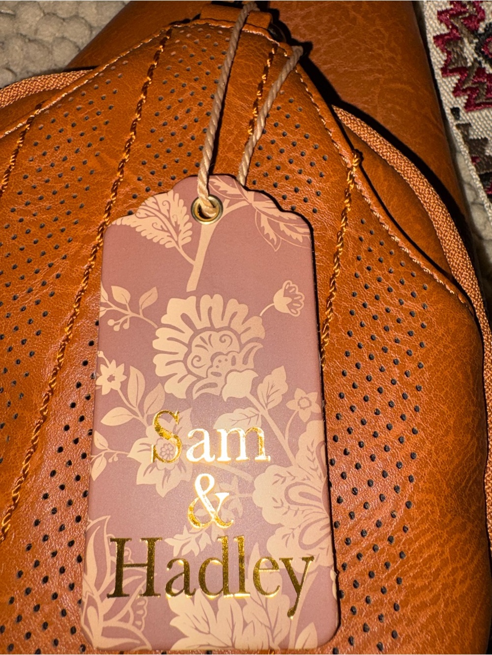 Sam & Hadley Perforated Shoulder Bag with Aztec print strap  2 zip comp, 1 poc .